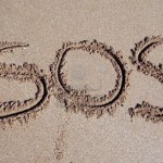 sos signal in the sand