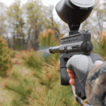 paintball gun firing in feild