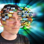 man with information screens spinning around head