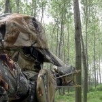 camo man with catapult