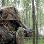 camo man with catapult