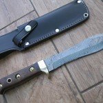 white hunter knife and sheath