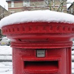 red letterbox with snow