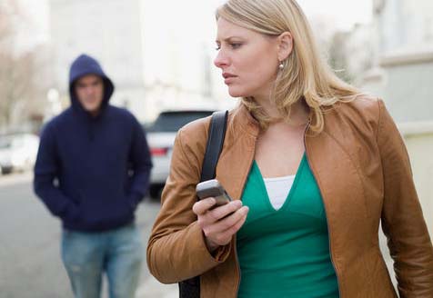 woman being stalked by man farg gel defence spray with woman being stalked by a man