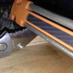 serrated edge on knofe being sharpened
