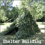 SHELTER BUILDER AT THE WILDERNESS GATHERING SHOW