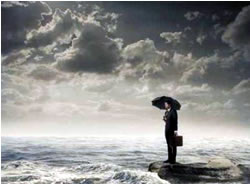 man looking at the sea