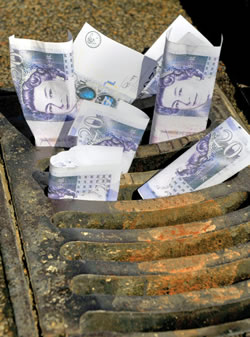 money going down a drain