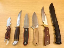 feathering wood with a knife