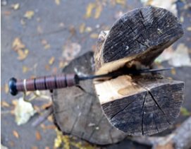 feathering wood with a knife