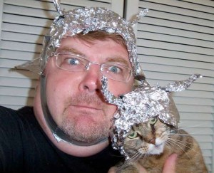man and cat wearing foil hats