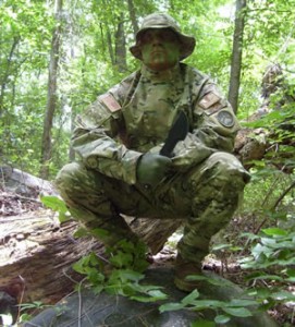 camo man in jungle